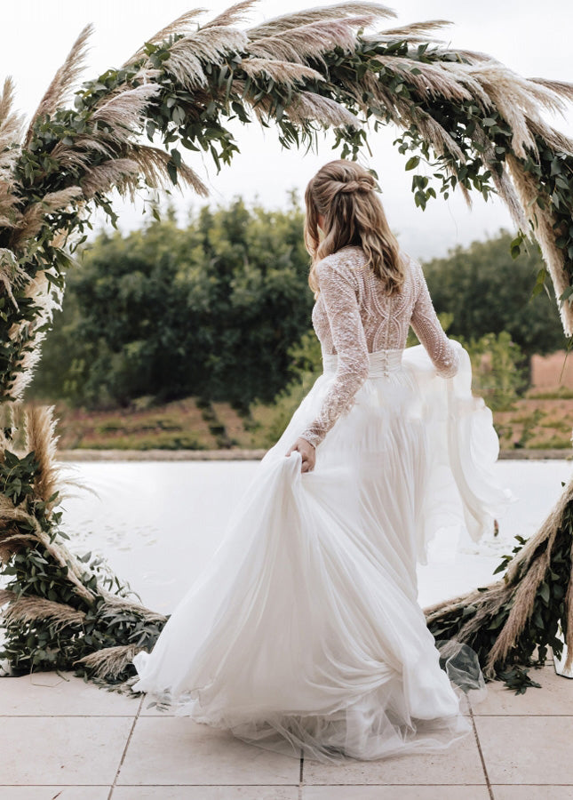 Luxurious A-Line Tulle Wedding Dress with Pleats, Lace Beading, and Long Sleeves