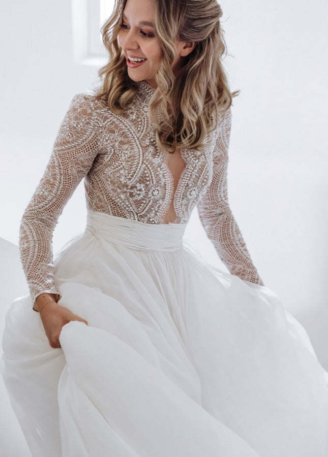 Luxurious A-Line Tulle Wedding Dress with Pleats, Lace Beading, and Long Sleeves