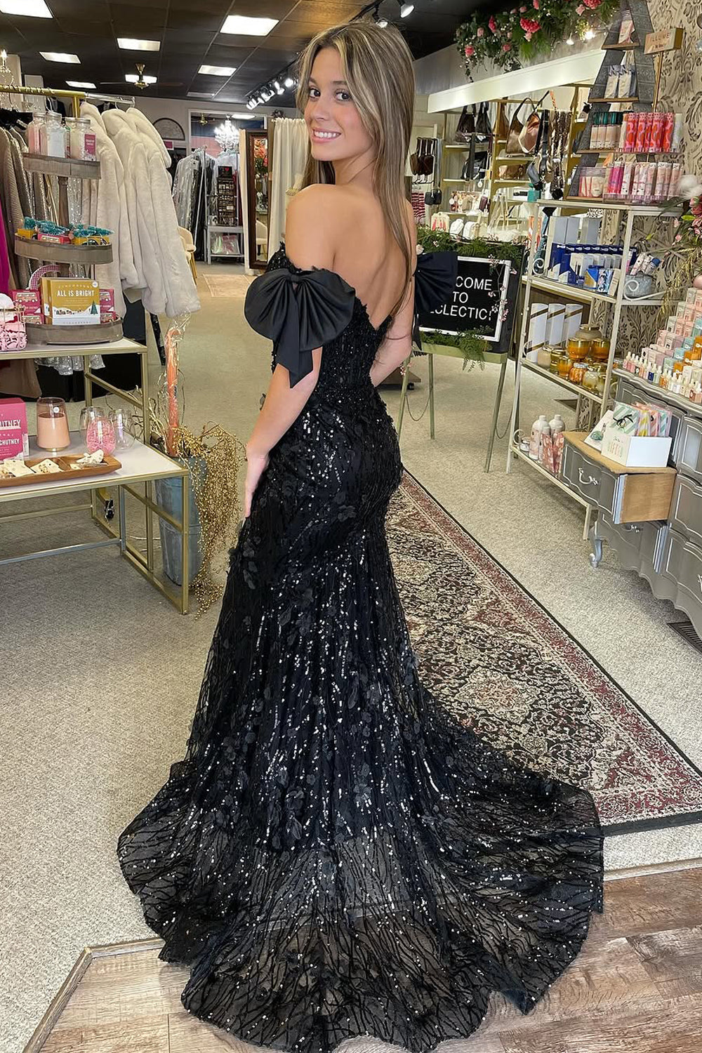 Elegant Mermaid Black Sequin Prom Dress with Off-the-Shoulder Design and Bow Detail