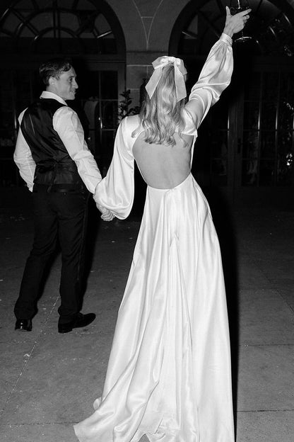 Gorgeous A-Line Deep V-Neck White Satin Bridal Dress with Ruffled Sleeves