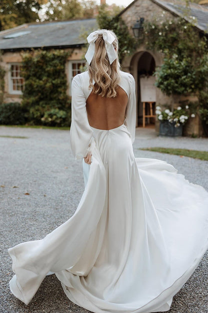 Gorgeous A-Line Deep V-Neck White Satin Bridal Dress with Ruffled Sleeves
