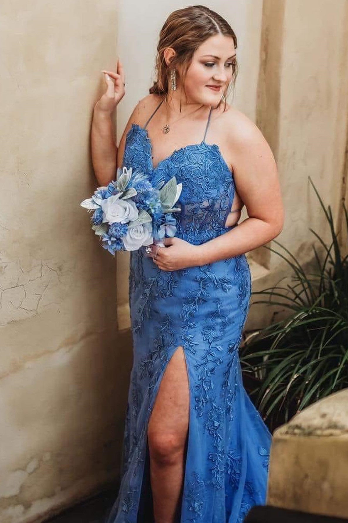 Royal Blue Mermaid Prom Dress with Spaghetti Straps, Slit, and Floral Appliques Detail