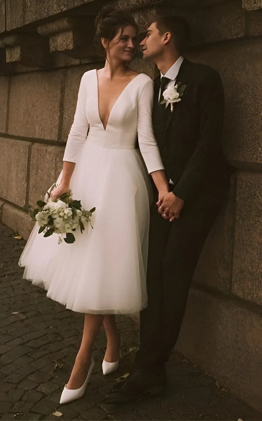 Vintage-Inspired Satin A-Line Tea-Length Wedding Dress with Long Sleeves and Plunging Neckline
