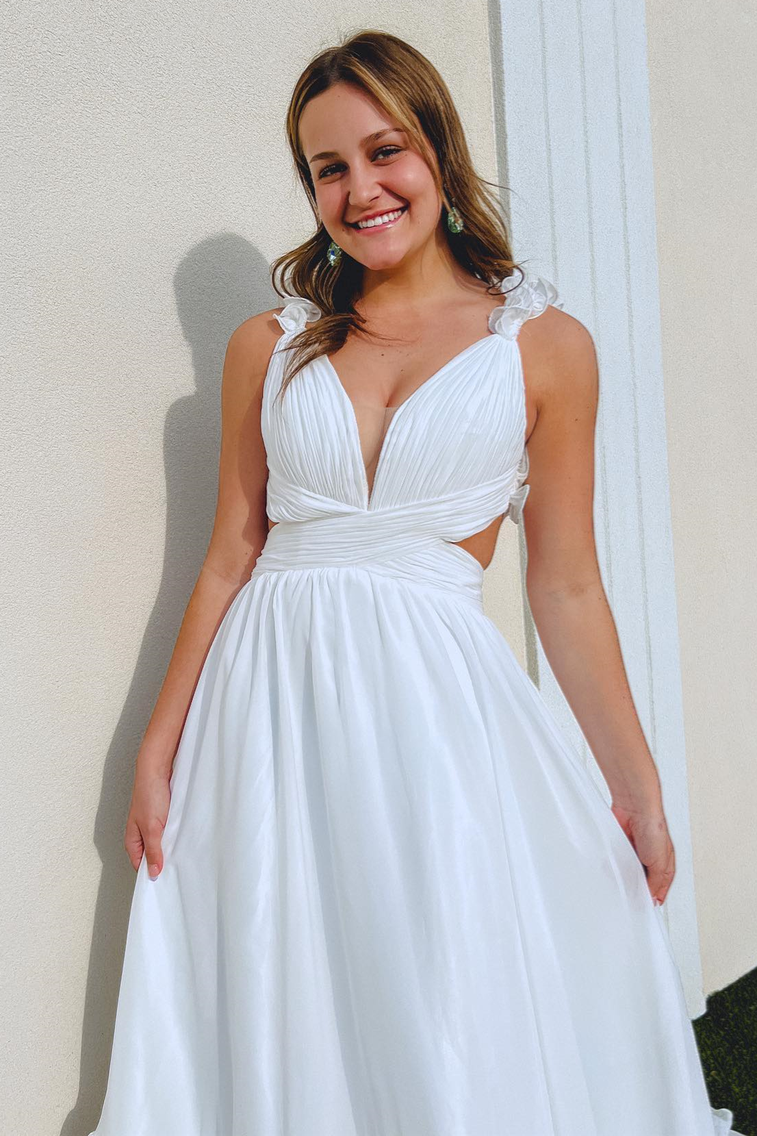 White A-Line Prom Dress with Ruffle Straps, Pleated Cut-Out, and Deep V-Neck